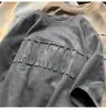 Camiseta Corta de Manga Corta Estilo Perezoso Chic Transfronteriza para Hombres y Mujeres, Diseño de Nicho para Estudiantes de Arte, Atuendo de Pareja, Manga Media de Gama Alta