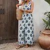 Vestido sin mangas de cuello redondo con abertura y estampado floral de estilo étnico festivo nuevo 2026 transfronterizo europeo y americano de Amazon para mujer