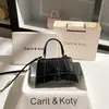 Dropshipping Bolsos de Alta Gama 2025 Patrón de Cocodrilo Bolso Reloj de Arena Otoño e Invierno Versátil Bolso de Hombro Cruzado Bolso de Mano al por Mayor