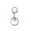 Aleación de Zinc Dorado Accesorios para Llaveros al por Mayor Hebilla de Langosta Juego de Tres Piezas Juguetes DIY Eggboy Fiesta Accesorios para Llaveros