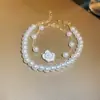 Pulseira Trançada de Pérolas com Zircônia Rosa Manta, Luxo Leve, Alta Qualidade, Pulseira Fashion e Requintada, Joia de Mão Simples e Versátil para Mulheres