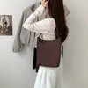 Bolso tipo cubo de cuero PU de gran capacidad minimalista estilo coreano, un artículo de moda transfronterizo de alta gama y único, perfecto para ir al trabajo y el uso diario, un bolso de hombro tote para mujer