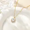 Collares de Doce Piedras de Nacimiento Transfronterizos Europeos y Americanos de Venta Caliente, Adornos para el Cuello de Gama Alta, Cadenas para la Clavícula en Forma de Corazón con Circonita Microincrustada Venta al por Mayor