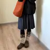 Saia plissada de malha macia e elástica para mulheres, novo estilo outono e inverno 2026, cintura elástica, versátil, linha A que afina, saia plissada com barra larga
