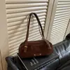 Colección de otoño 2026 transfronteriza: un bolso de hombro elegante y moderno con un toque lujoso y vintage, hecho de gamuza, perfecto para ir al trabajo y para el uso diario