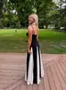 Vestido de tirantes ajustado de color contrastante blanco y negro, estilo francés elegante, para mujer, nuevo de primavera 2025, transfronterizo europeo y americano