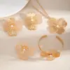 Conjunto de joyería de perlas exageradas personalizado transfronterizo europeo y americano para mujer, collar hueco de flor versátil estilo vintage para mujer al por mayor