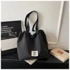 Bolsa de Lona Casual de Grande Capacidade para Mulheres 2026 Nova Leve Versátil para o Dia a Dia Ombro Transversal Bolsa Tote Fashion