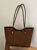 Bolso tote único, simple, elegante y de alta calidad, nuevo modelo de verano 2026, color liso, de nicho, casual, bolso de hombro de alta apariencia, moderno