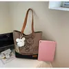 Bolsa Elegante da Moda 2025 Nova Bolsa de Ombro de Nicho Bolsa de Lona Bolsa Tote Bolsa de Lona Grande Capacidade Bolsa Feminina