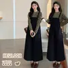 Ropa de maternidad otoño e invierno nuevo conjunto de top interior a rayas + falda con tirantes negra bolsillos grandes cubre abdomen holgado ajustado al cuerpo para usar por fuera