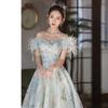 Vestido de noche francés de alta gama para mujer, nicho de lujo ligero, hombros descubiertos, prueba de arte, anfitrión, vestido de alta gama, primavera