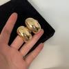 Brincos de garanhão geométricos brilhantes de textura de metal de personalidade transfronteiriça europeia e americana para mulheres ins brincos de viajante de estilo frio