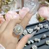 Camélia Super fada elegante elegante elegante flor de pérola anel diário requintado incrustado de diamante Anel francês vintage feminino