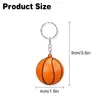 Llavero Popular de Baloncesto de PU Transfronterizo 4cm Espuma Esponjosa Colgante para Mochila Deportiva Patrón de Logo Impreso