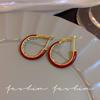 Pendientes circulares rojos, modernos y atmosféricos, sencillos y combinables, con un diseño de nicho lujoso, ligero y exquisito, de alta gama y finos para mujer.