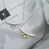 Outono e Inverno nova corrente de clavícula elegante banhada a ouro real com zircônia incrustada design de nicho feminino pingente de coração colar de pérolas