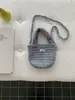Bolso de mano y bandolera de lana hecho a mano para niños de otoño e invierno, bolso pequeño de punto de color liso, adecuado para niños y niñas, usado como monedero