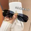 Gafas de Sol Nuevas Sin Marco Tendencia Versátiles Unisex Alta Apariencia Textura Premium Protección Solar Gafas de Sombra