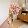 Chaveiro Banhado a Ouro 999 Mais Vendido, um Item de Sucesso para Provas, Presente Dourado para Exames de Ensino Médio e Vestibular, Promoção de Transmissão ao Vivo Atacado