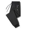 Pantalones deportivos holgados de talla grande Spring Fat transfronterizos 2025 Nuevos pantalones deportivos casuales para hombre Marca de moda para combinar con todo