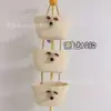 Cesta colgante de tres capas del fabricante Cesta de cuerda de algodón para Año Nuevo Decoración Cesta de almacenamiento de cosméticos de tres Ouli de dibujos animados Cesta para el hogar montada en la pared