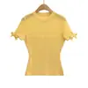 Camiseta de malha com gola redonda lisa, manga curta, estilo gravata borboleta, com detalhes vazados, novo estilo de verão, top versátil e bonito para meninas da moda