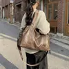 Bolso de hombro estilo coreano más vendido 2026 bolsa de viaje vintage para mujer bolso de mano casual bolso de mano retro de gran capacidad