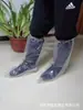 En stock venta al por mayor cubierta de zapato desechable cubierta para botas altas alargada engrosada larga cubierta de zapato de plástico PE cubierta de zapato de fábrica de cría