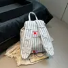 Versión Coreana de la Nueva Mochila de Conejo con Orejas Lindas de Dibujos Animados, Mochila Bidimensional Rayada, Mochila Linda Fresca y Suave