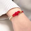 Cuerda de mano de flor de durazno tejida a mano diy Nudo Ruyi Cuerda roja Pulsera de este año Pulsera con colgante de cera de abeja dorada para llevar