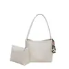 Bolsos populares para mujer de este año 2025 nuevo moderno moda retro bolso de hombro versátil para el día a día bandolera bolso tipo cubo