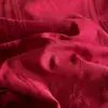 Juego de ropa de cama de cuatro piezas de gasa de doble capa jacquard teñido en hilo de algodón, algodón puro, lujo ligero, tacto de alta gama, sábana plana, funda de edredón, sábana bajera, rojo brillante