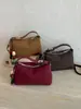 Elegante y chic bolso de mano tipo dumpling para mujer, nuevo modelo otoño e invierno 2026, patchwork de estampado de leopardo de lujo ligero para uso diario, bolso de hombro y cruzado