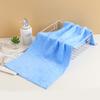 Toalla de forro polar coral 35*75 toalla facial lisa suave absorbente no fácil de perder pelo toalla facial para limpiar al por mayor