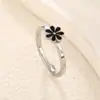 Anel de Flor Margarida de Aço Inoxidável Transfronteiriço Nicho High-End Anel de Joia com Óleo Preto Venda por Atacado