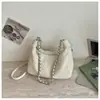 Bolsa transversal de design de moda transfronteiriça feminina nova estilo coreano nicho casual para o dia a dia textura tecida versátil bolsa de ombro único