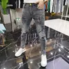 Jeans Europeos para Hombre de Primavera y Otoño Marca de Moda Cabeza de Tigre Pedrería Personalizados Corte Delgado Moda Retro Elásticos
