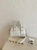 Bolsa de Mão Bowling de Moda de Nicho de Alta Qualidade Feminina 2026 Novo Estilo Coreano Moda Simples Bolsa de Ombro Transversal