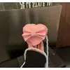Cadena de Perlas con Lazo para Niñas 2026 Verano Nueva Moda Infantil Monedero con Forma de Corazón Bolso Cruzado Lindo