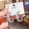 Pendientes de Moda Europeos y Americanos con Circonita Micro-Pavimentada para Mujer Aguja de Plata S925 Pendientes Personalizados Lujo Accesible Pendientes Versátiles de Gama Alta Elegantes