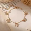 Calzador de mujer sencillo y de moda, de gran venta internacional, con forma de mariposa, estilo europeo y americano, ideal para la playa.