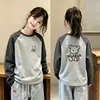 Camada base térmica feminina com forro de fleece, autocalor, novo estilo outono/inverno, camiseta da moda, gola redonda, quente, blusa de manga comprida com retalhos para bebês