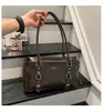 Bolso tote de nicho de alta gama estilo coreano 2026 para mujer, gran capacidad, bolso de hombro para ir al trabajo, bolso de mano moderno y versátil