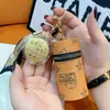 Año del Caballo Oro Puro 999 Llavero de Riqueza Instantánea Bolsa Mini de Oro para Labial Bolsa para Auriculares Colgante Pequeño Regalo Venta al por Mayor
