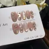 Uñas Postizas Cruzadas Color Rosa Melocotón Estilo Celebridad de Internet Fresa Dulce Cruzadas, Puntas de Uñas Versátiles Rosa Nude Suave Aurora que Realzan el Tono de Piel