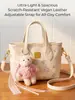 Bolsa feminina de nicho estilo estrangeiro, nova moda 2026, bolsa de mão pequena super popular para trabalho, bolsa de ombro e transversal tipo balde