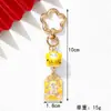 Amuleto estilo INS gato de la suerte de cerámica flor de ciruelo llavero colgante metálico decoración para bolso para buena suerte y salud