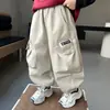 Pantalones Cargo para Niños Niños 2026 Primavera y Otoño Nuevo Estilo Pantalones Jogger Bebé Color Sólido Casual Largos Modernos y Versátiles