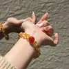 Pulseira de Cristal Amarelo Torre e Ágata Vermelha para Mulheres, Design de Nicho de Luxo Leve, Atrai Riqueza e Vira Sorte, Presente de Pulseira de Alta Qualidade